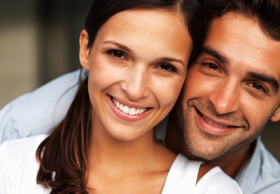 bigstock-Attractive-couple-smiling-whil-20114168.jpg